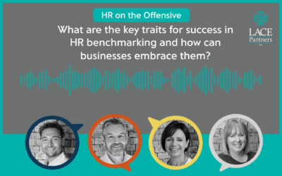 What are the key traits for success in HR benchmarking and how can businesses embrace them?